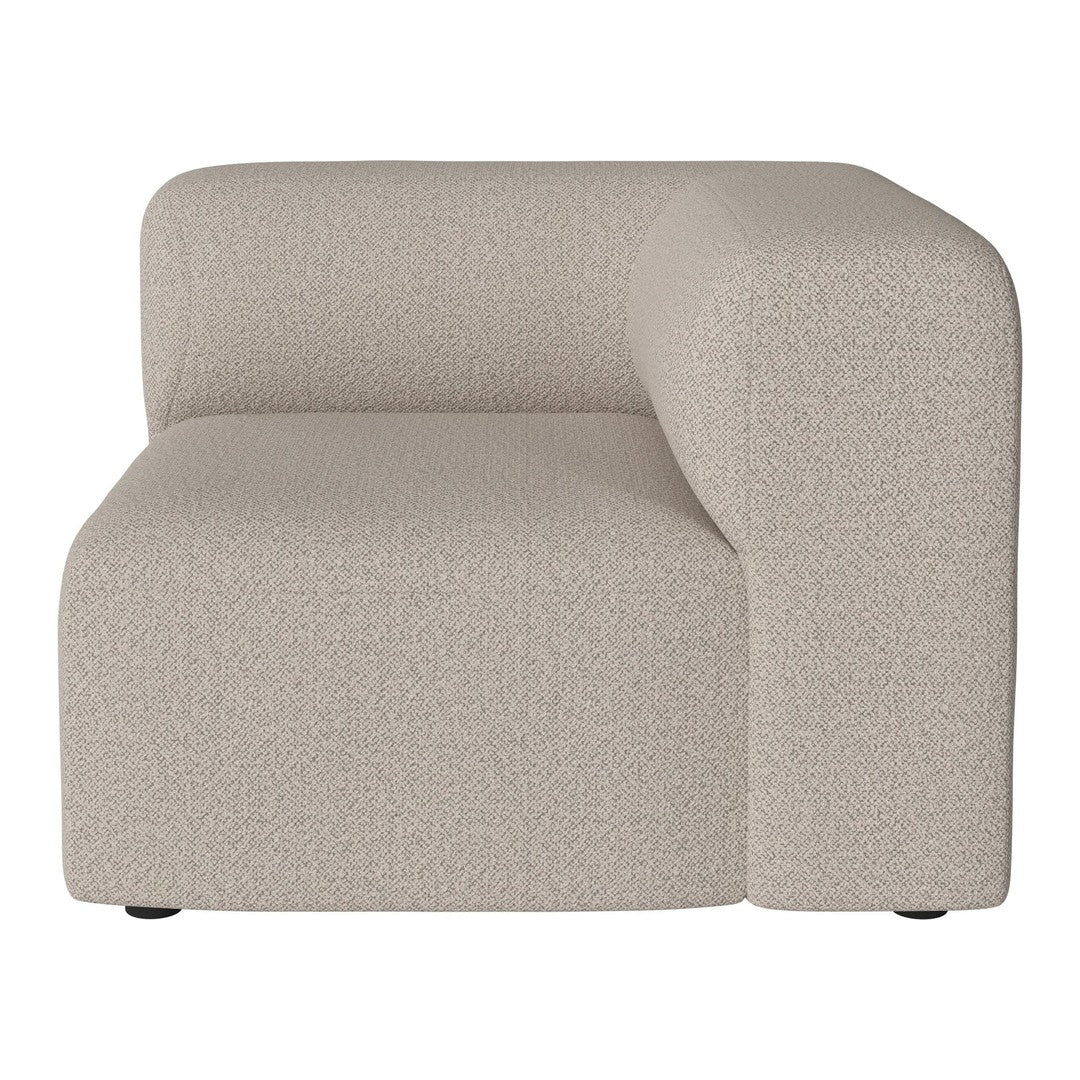 Beige, textured fabric sectional sofa in a modern, minimalist design with a smooth, curved armrest.