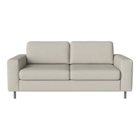 Cream-colored sofa with a smooth texture and modern design, featuring clean lines and minimalist style.