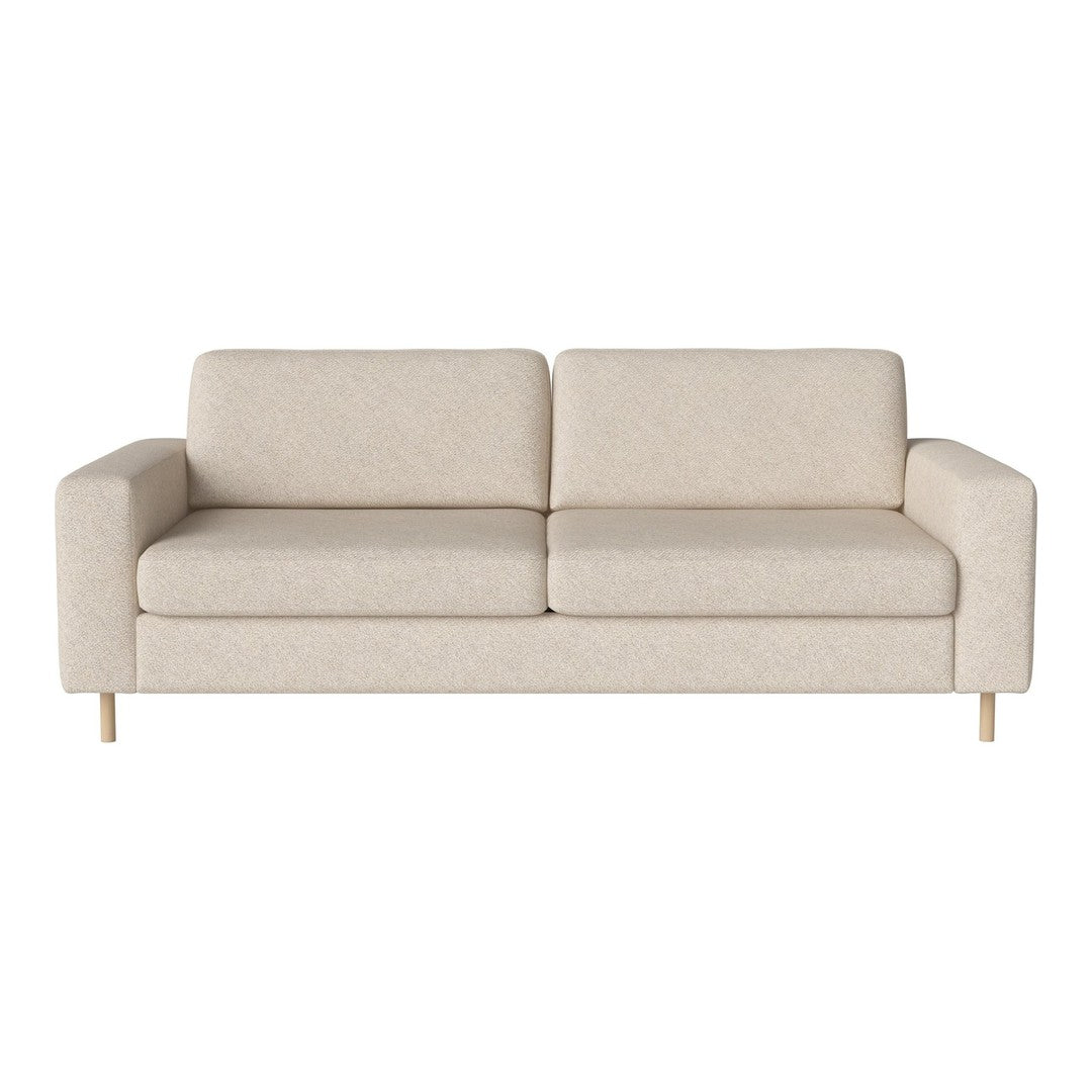 Light beige fabric sofa with a smooth, textured pattern and natural wood legs for a contemporary look.