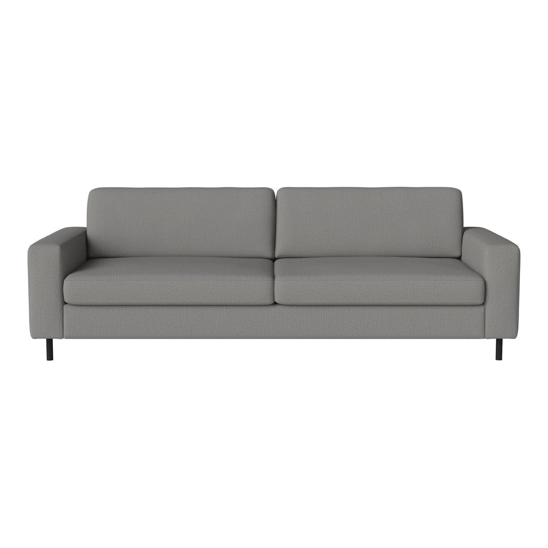 Gray upholstered sofa with a minimalist design and sleek lines, perfect for modern decor. 