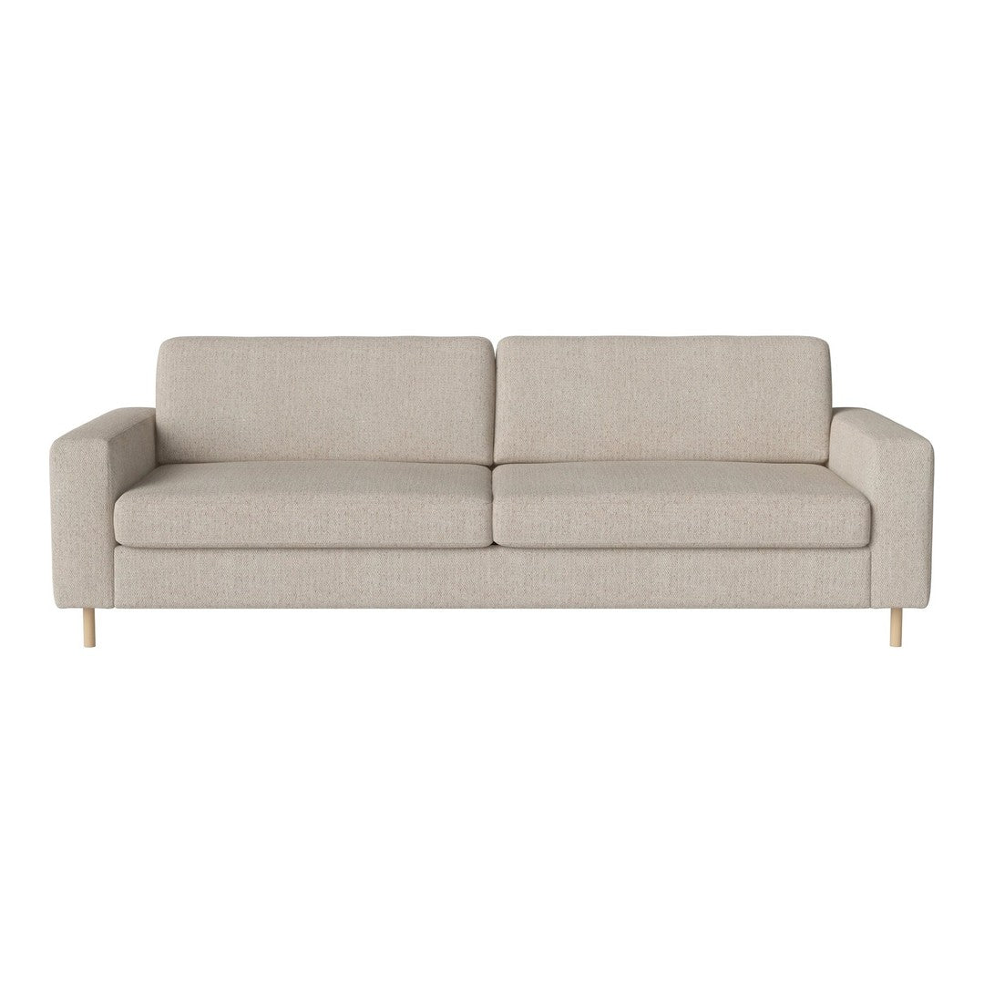 Light beige sofa with a smooth texture and minimalistic design, featuring straight lines and wooden legs.