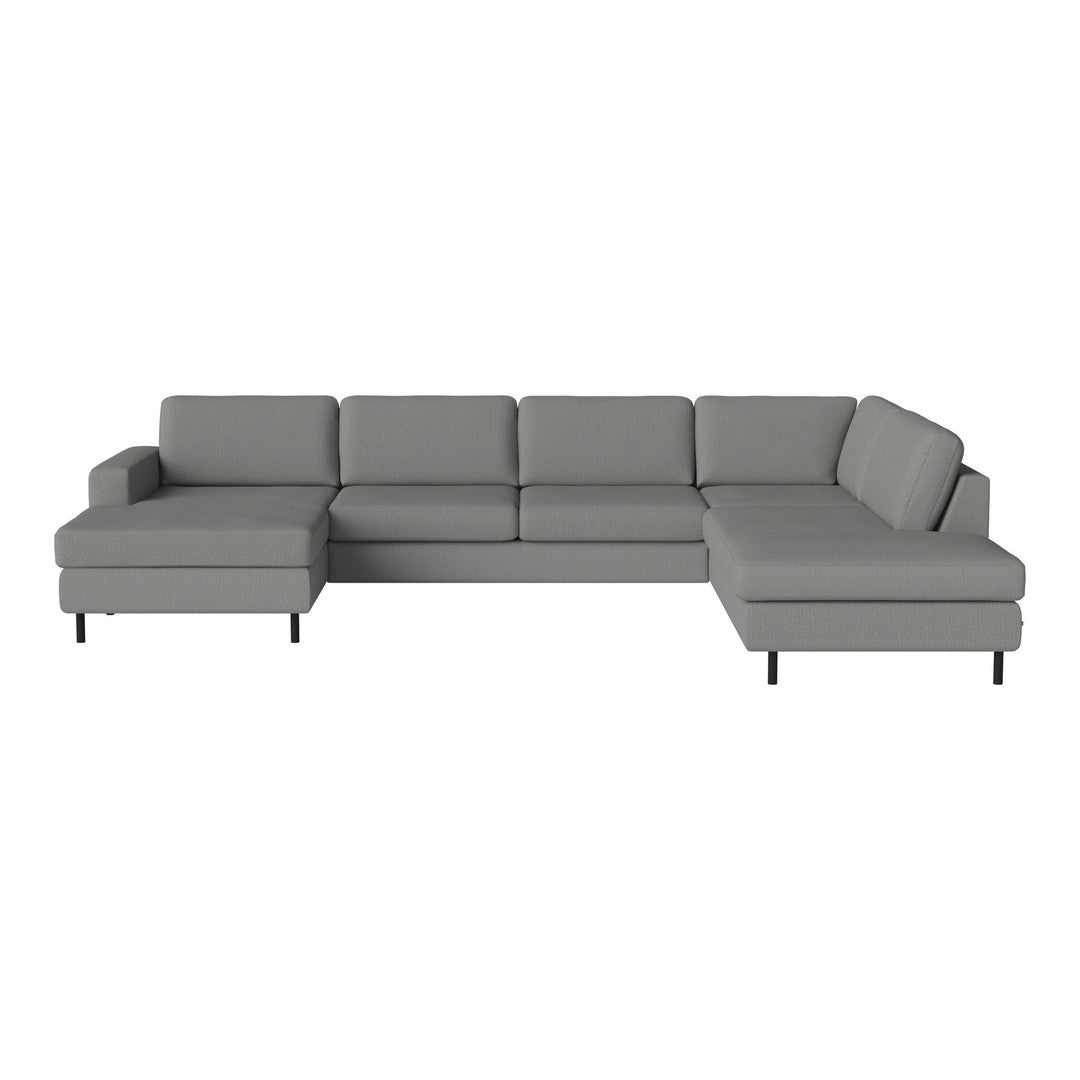 Gray sectional sofa with a smooth fabric finish and modern design, featuring minimalist patterns and sleek black legs.