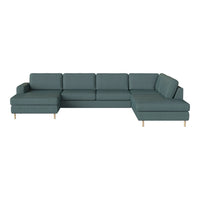 Teal sectional sofa with a minimalist design and light wooden legs, featuring soft, textured upholstery.
