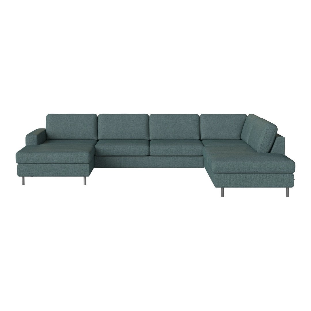 Stylish teal sectional sofa with a modern design and sleek lines, perfect for contemporary living spaces.