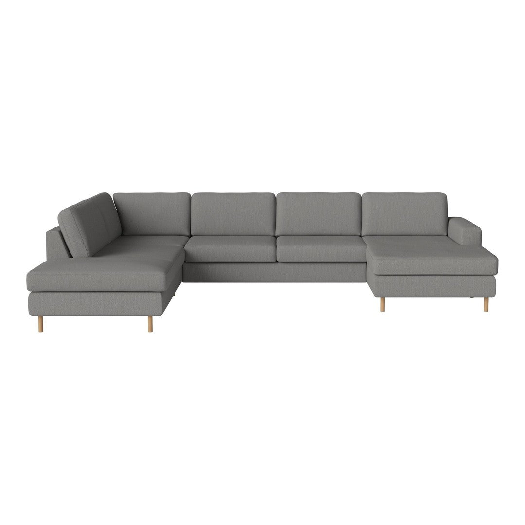 Gray sectional sofa with a modern design and subtle texture, featuring smooth upholstery and light wooden legs.