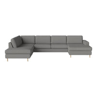Modern gray sectional sofa with clean lines and soft fabric, featuring minimalist design and wooden legs.