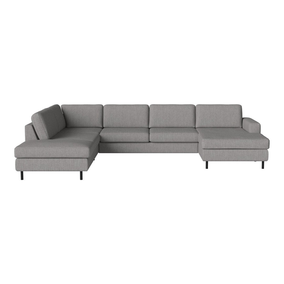 Gray sectional sofa with a minimalist design and clean lines, featuring solid fabric upholstery and sleek black legs.