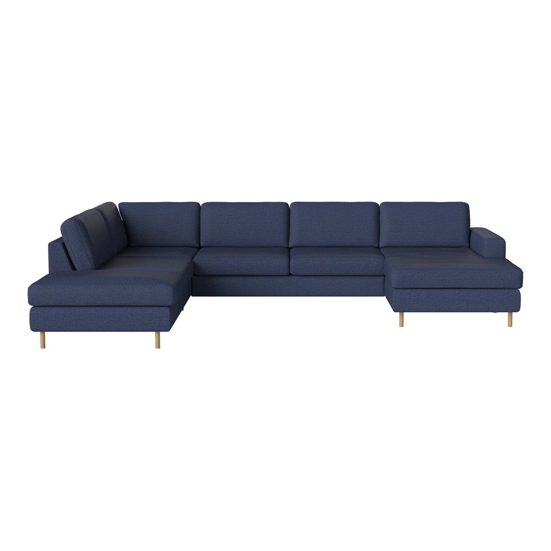 Navy blue sectional sofa with clean lines and solid pattern, featuring wooden legs for a modern touch.