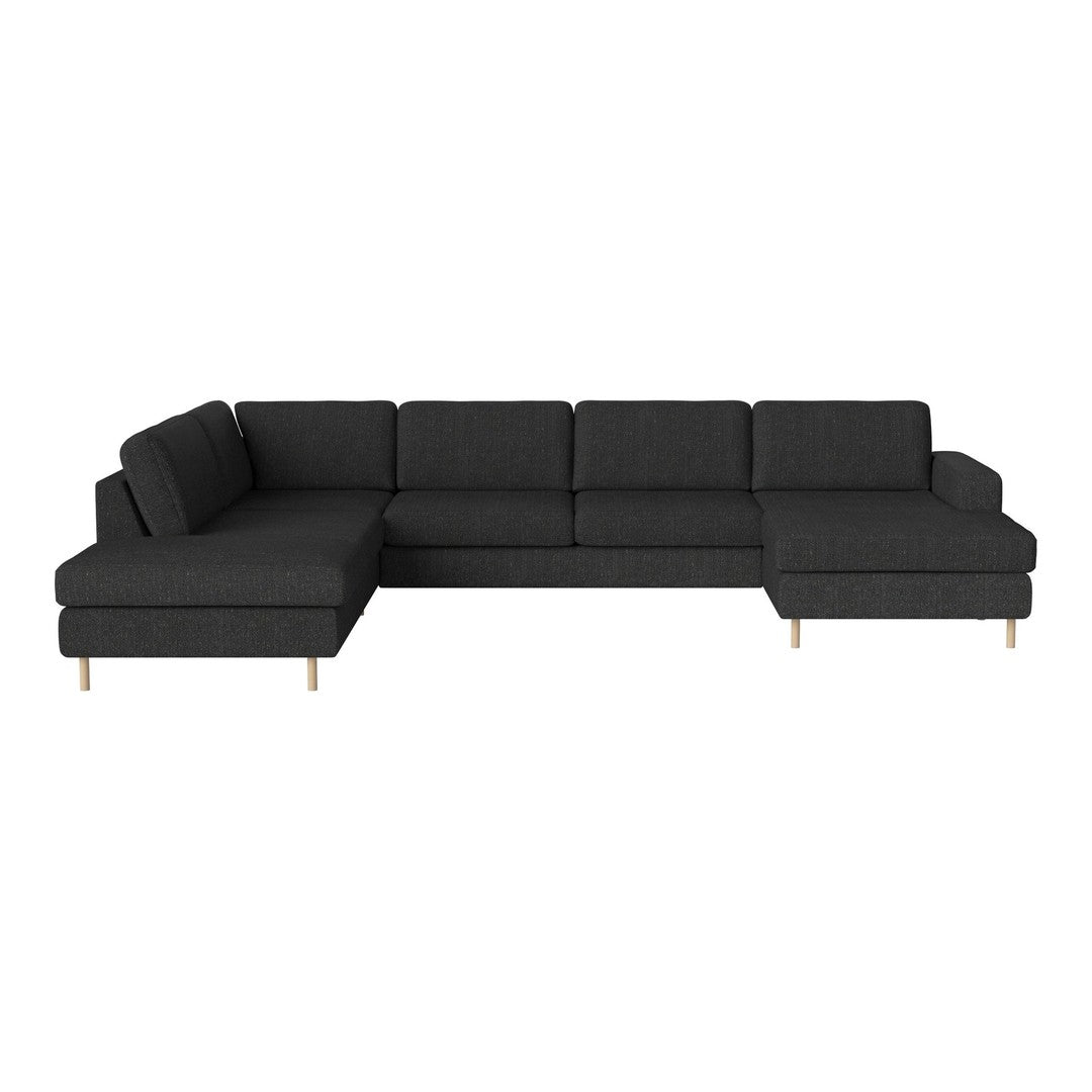 Modern L-shaped sofa in solid charcoal gray fabric with clean lines and natural wood legs for a minimalist look.