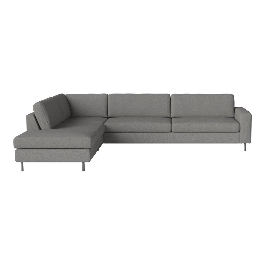 Modern gray sectional sofa with a sleek design and clean lines, featuring smooth fabric upholstery.