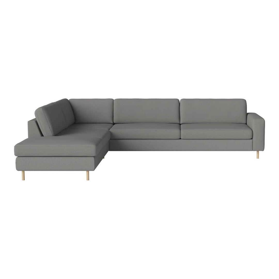 Gray sectional sofa with clean lines and wooden legs, perfect for modern interiors.