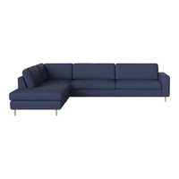 Navy blue sectional sofa with clean lines and solid fabric, featuring a minimalist design and wooden legs.