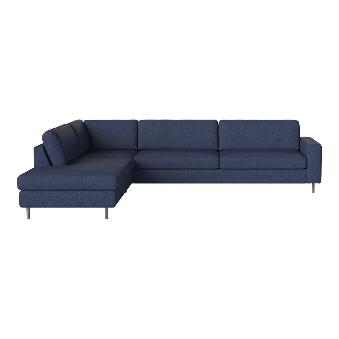 Navy blue sectional sofa with a sleek, modern design and subtle horizontal ribbed pattern.