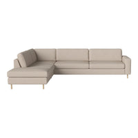 Beige L-shaped sofa with clean lines and wooden legs, perfect for modern living spaces.
