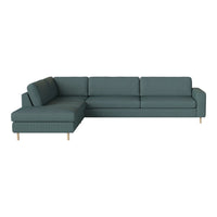 Teal sectional sofa with a smooth fabric texture and minimalist design, perfect for modern living spaces.