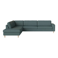 Teal sectional sofa with a sleek design and subtle textured fabric, perfect for modern living spaces.