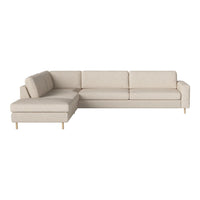 Beige sectional sofa with a minimalist design and smooth, modern lines. Perfect for contemporary living spaces.