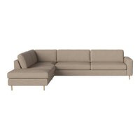 Beige sectional sofa with clean lines and a textured fabric, complemented by light wood legs. Modern and minimalist design.