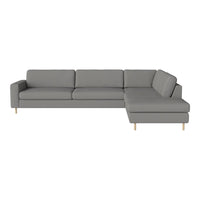 Gray sectional sofa with clean lines and subtle texture, featuring a modern design and wooden legs.