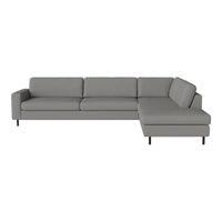 Gray sectional sofa with sleek, modern lines and no visible patterns, perfect for minimalist decor.