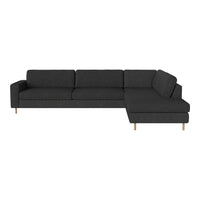 Dark gray upholstered sectional sofa with clean lines and natural wood legs, perfect for modern living spaces.
