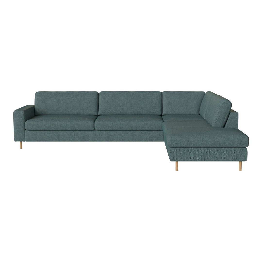 Teal sectional sofa with a smooth fabric texture and elegant wooden legs, perfect for modern living spaces.