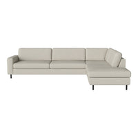 Light beige upholstered sectional sofa with clean lines and black metal legs. Modern minimalist design, no patterns.