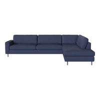 Dark blue sectional sofa with clean lines and a minimalist design, featuring solid colors and no visible patterns.