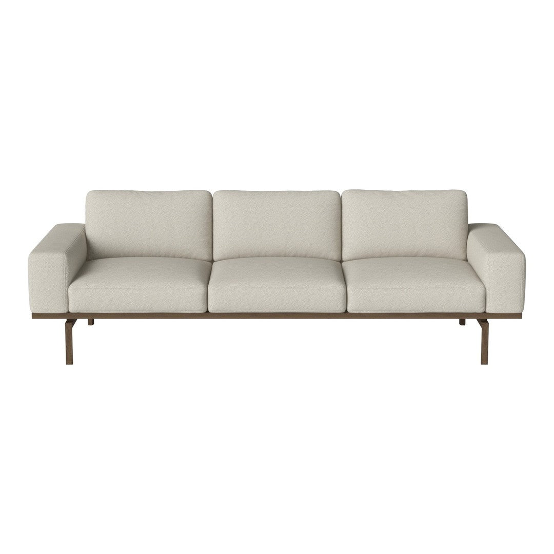 Light beige three-seater sofa with a sleek, minimalist design and smooth upholstery. Perfect for modern decor.