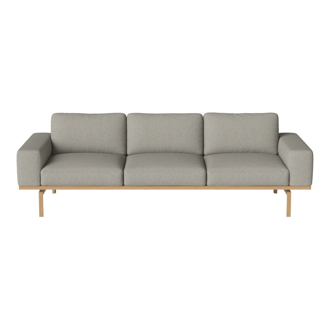 Gray fabric sofa with a minimalist design and light wood legs, featuring a smooth, solid color without patterns.
