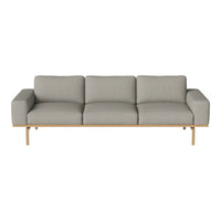Gray fabric sofa with a minimalist design and light wood legs, featuring a smooth, solid color without patterns.