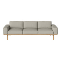 Light gray three-seater sofa with a minimalist design and wooden legs, featuring a smooth, solid fabric texture.