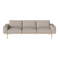 Light gray three-seater sofa with smooth fabric and wooden legs, offering a modern, minimalist design.