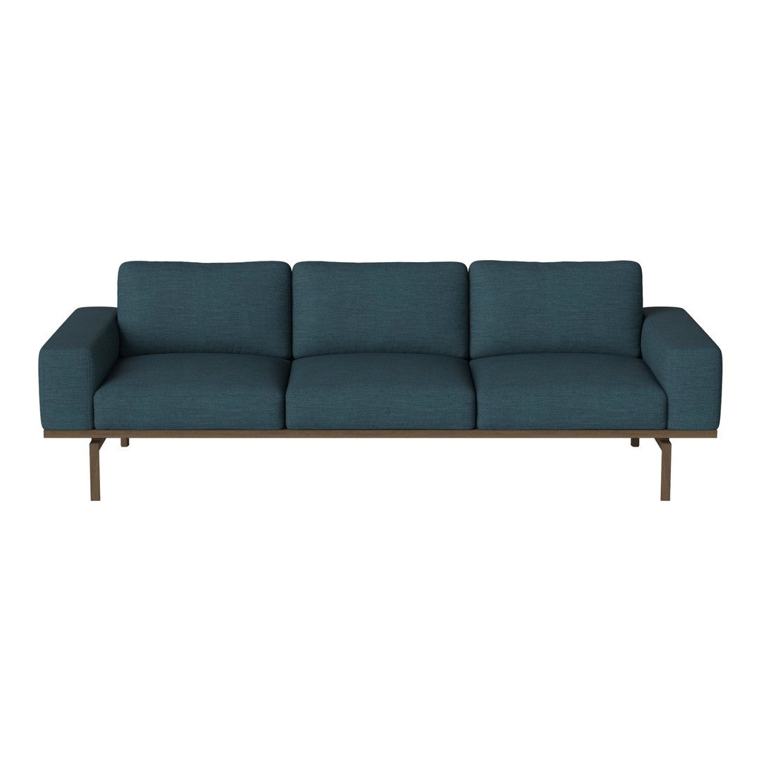 Teal three-seater sofa with a sleek mid-century design and minimalistic beige metal legs. Perfect for modern interiors.