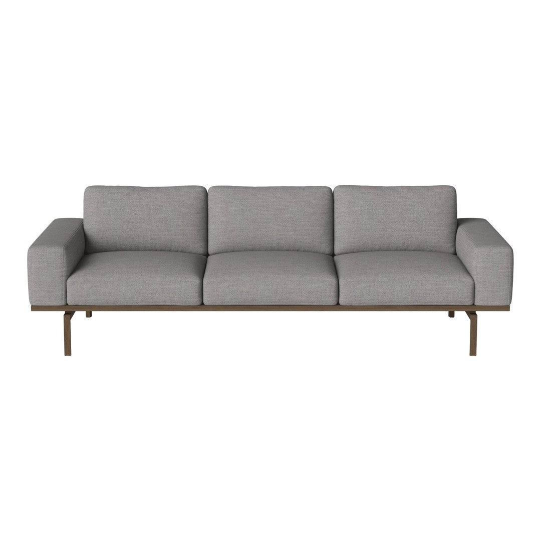 Gray upholstered sofa with a modern, minimalist design and smooth fabric texture. Suitable for contemporary interiors.