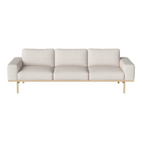 Light beige sofa with a minimalist design and subtle texture, featuring clean lines and a wooden base.