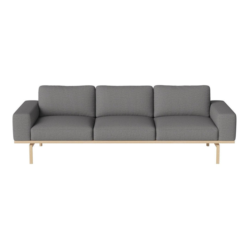 Gray upholstered sofa with solid wooden legs and a clean, modern design. Elegant and minimalist style for any space.