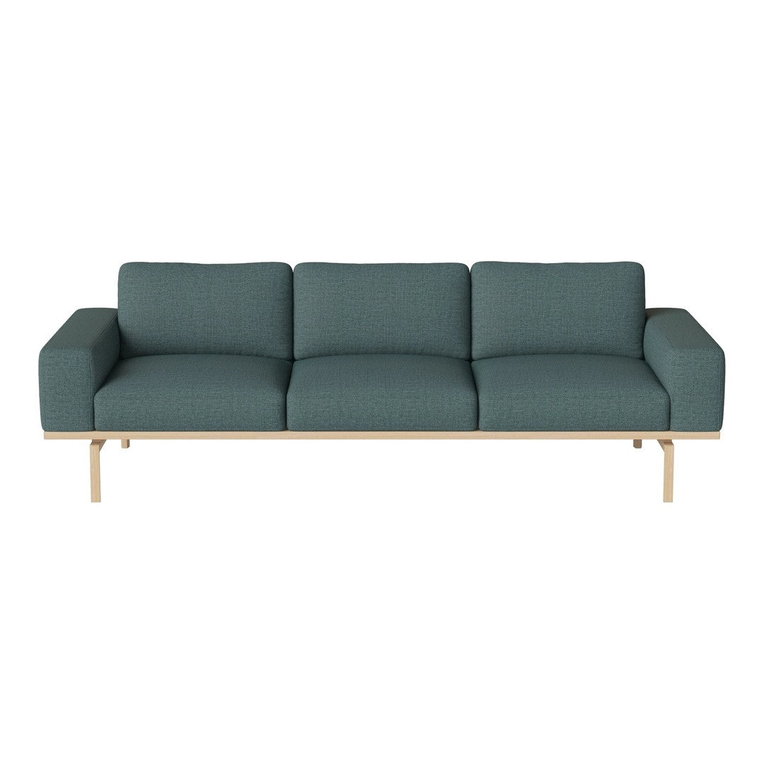 Teal three-seater sofa with a textured fabric and light wood base, offering a modern, minimalist design.