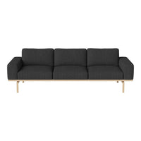 Sleek dark gray sofa with a minimalist design and light wood legs for a modern, stylish touch.