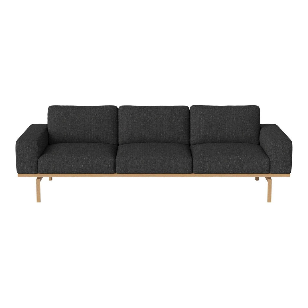 Stylish dark gray sofa with a minimalist design, featuring a wooden frame and clean lines. Perfect for modern interiors.