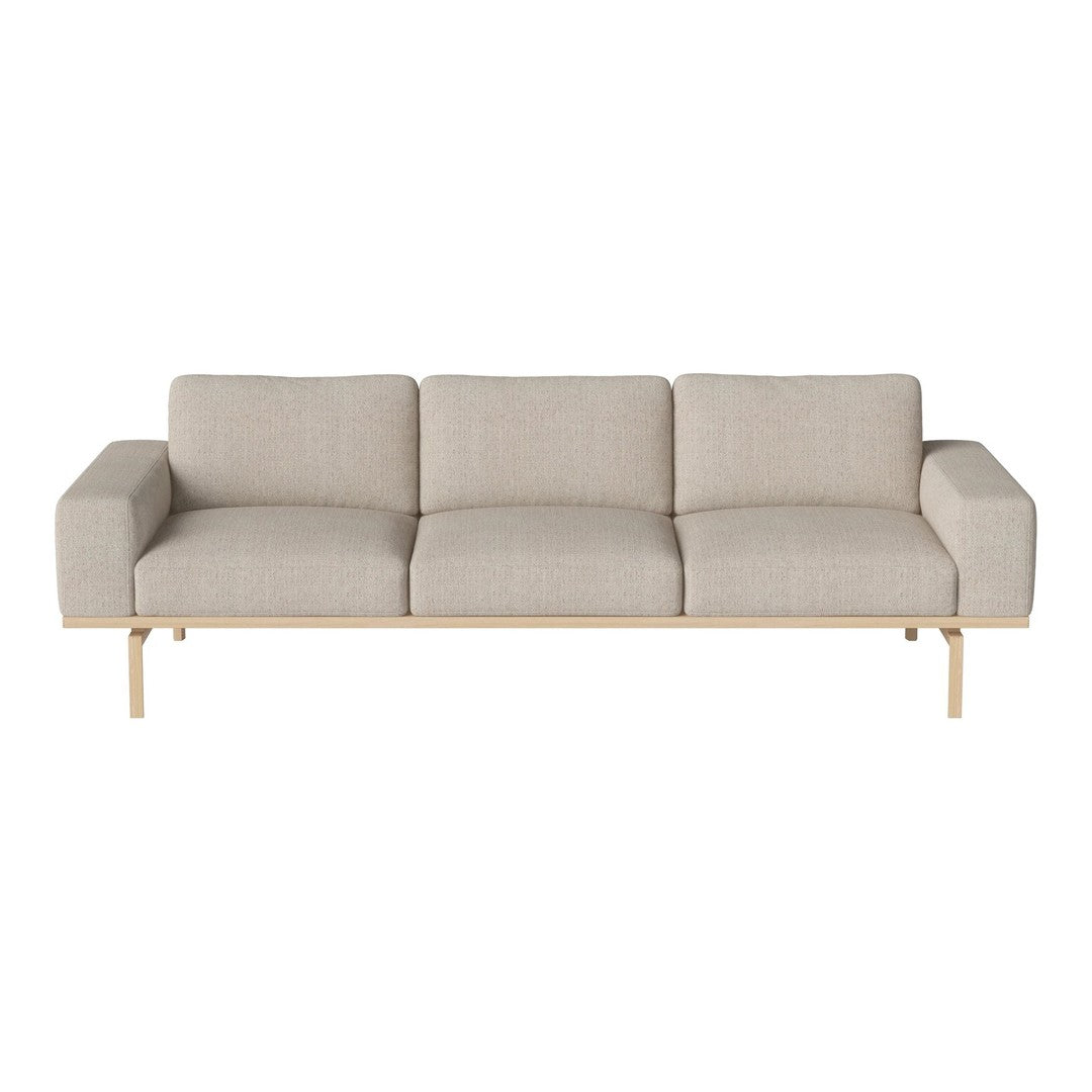 Light beige three-seater sofa with a textured fabric and minimalist wooden frame. Ideal for modern decor.