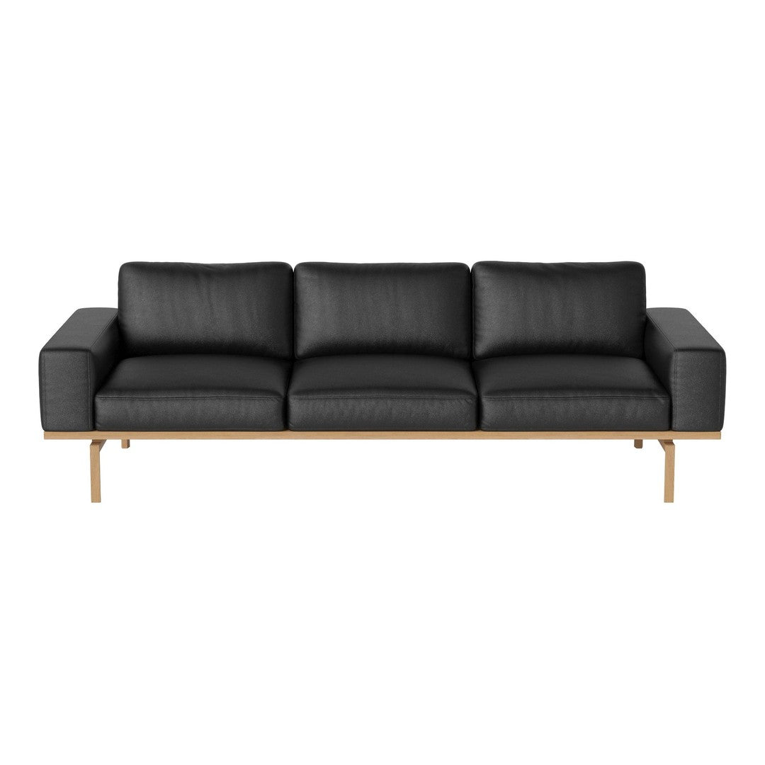 Modern black leather sofa with clean lines and a minimalist wooden frame. Ideal for contemporary living spaces.
