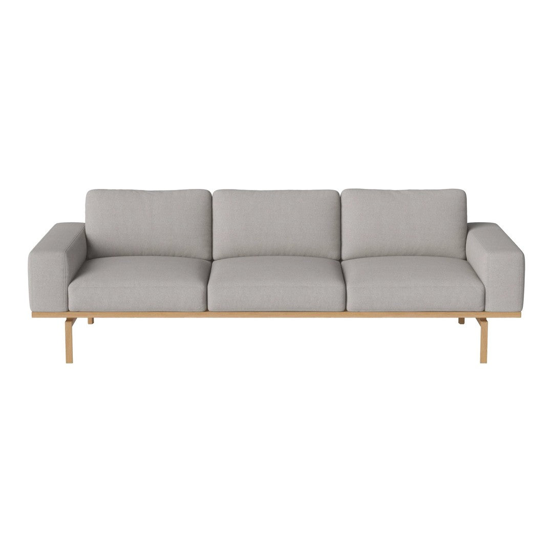 Light gray fabric sofa with a minimalist design and natural wood legs, offering a modern and neutral aesthetic.