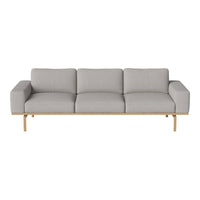 Light gray fabric sofa with a minimalist design and natural wood legs, offering a modern and neutral aesthetic.