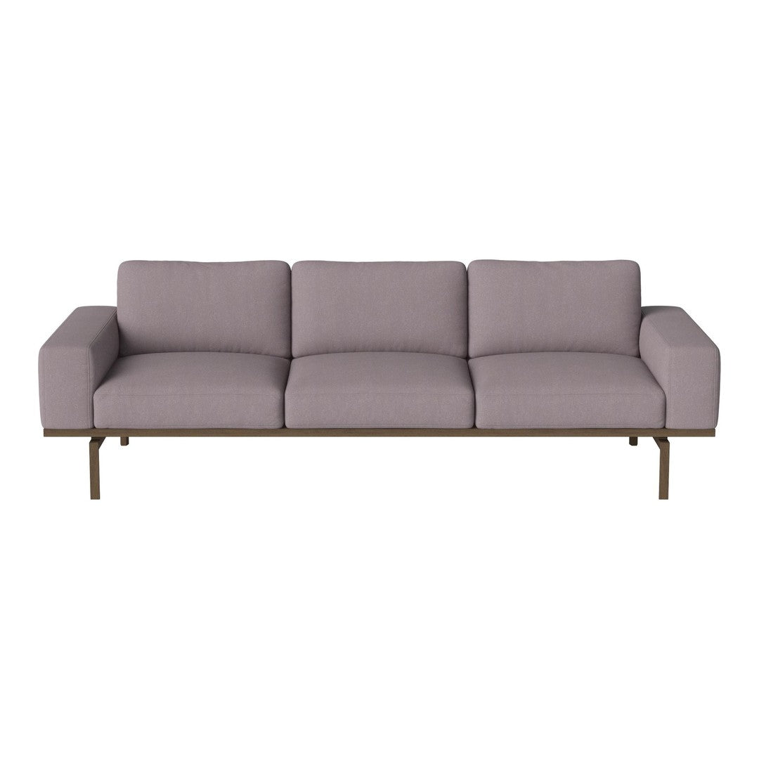 Modern three-seat sofa in soft lavender fabric with smooth lines and a minimalist bronze frame. Perfect for contemporary decor.