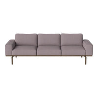 Modern three-seat sofa in soft lavender fabric with smooth lines and a minimalist bronze frame. Perfect for contemporary decor.