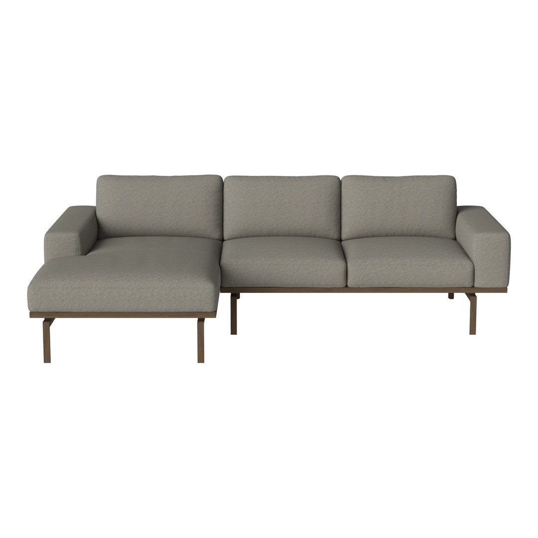 Gray sectional sofa with clean lines and a modern design, featuring a sleek fabric finish and minimalistic structure.