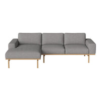 Gray fabric sectional sofa with a minimalist design and natural wood legs. Modern, sleek, and versatile style.
