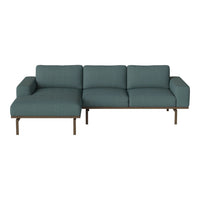 Teal fabric sofa with a sleek, modern design and subtle texture, featuring a minimalist wooden frame.