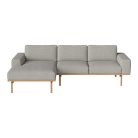 Light gray upholstered sectional sofa with a minimalist design and wooden legs, ideal for modern interiors.